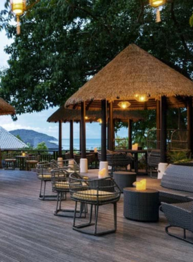 : This image shows Tree Tops Sky Dining in Koh Samui, a luxurious treetop restaurant offering private dining pods. It highlights the romantic atmosphere, gourmet dishes, and breathtaking views of the surrounding forest and ocean.