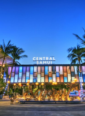 This image shows Lamai Central Plaza in Koh Samui, a night market venue with lively bars, live music, and a variety of food stalls offering local flavors and drinks.