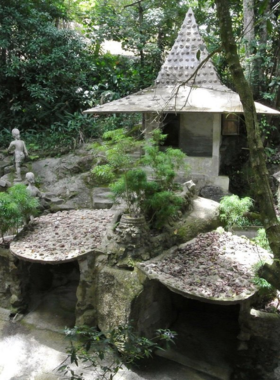 This image shows colorful, mystical statues in the Ta Nim Magic Garden, a hidden gem in the Koh Samui jungle. The tranquil garden is a peaceful spot to explore and appreciate the unique artwork surrounded by lush greenery and serene views.