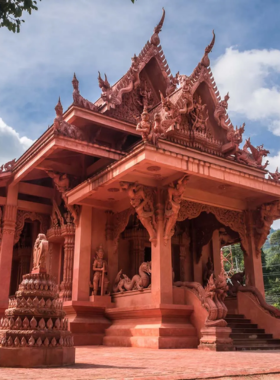 This image shows the picturesque Wat Sila Ngu Temple in Koh Samui, with its striking red exterior and panoramic views of the sea. The temple offers a tranquil space for reflection and is a peaceful cultural spot for visitors seeking spiritual moments.