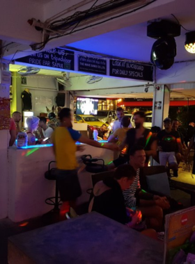 This image shows the relaxed, friendly vibe of Pride Bar in Koh Samui. Known for its inclusive atmosphere, the bar offers pool tables, fun games, and a casual place to unwind, socialize, and enjoy a drink with friends or fellow travelers.