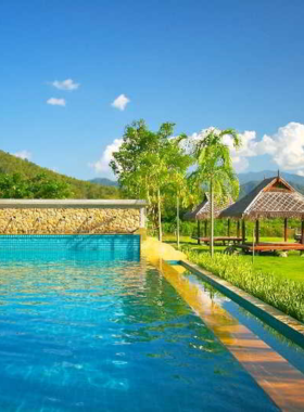 This image shows Pai Eco Resort, an eco-friendly resort offering guests a sustainable travel experience with nature activities and organic meals. The resort focuses on sustainable practices, including organic farming and eco-tourism. It’s perfect for travelers who want to connect with nature and support responsible tourism while enjoying comfortable accommodations in Pai’s scenic surroundings.