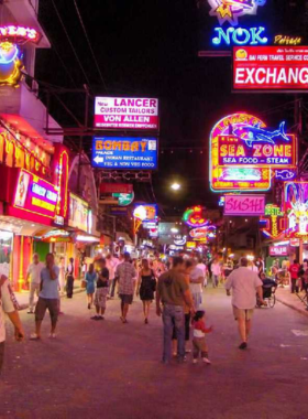 This image shows the vibrant nightlife in Pattaya, Thailand, with brightly lit bars, clubs, and beach parties. The lively atmosphere, music, and nightlife options make Pattaya and Bangkok exciting destinations for those looking to experience Thailand’s party scene.