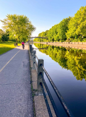 This image shows the Ottawa River Pathway, a beautiful trail that runs along the river’s edge, offering a peaceful setting for walking, cycling, or jogging. The pathway provides breathtaking views of the Ottawa River, lush greenery, and scenic spots perfect for a relaxing break. Whether you’re a fitness enthusiast or just looking for a quiet escape from the city, the Ottawa River Pathway offers a serene way to enjoy the beauty of nature in Ottawa.