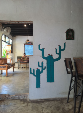 This image shows a delicious fish taco platter served at Cafecito in Pai, surrounded by colorful decor and a cheerful vibe. The cafe's signature Mexican dishes are presented with fresh ingredients, making it a favorite for a flavorful meal.