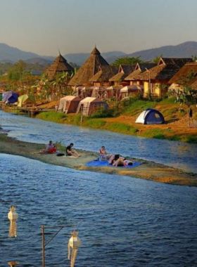 This image shows the vibrant streets of Pai with colorful shops, lively markets, and mountain views in the distance. It captures the charm of Pai’s urban life blended with its stunning natural surroundings.