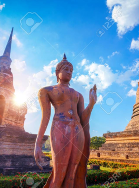 This image shows the tranquil Wat Sa Si temple set on an island within a lotus-filled pond. The serene atmosphere, especially at sunrise or sunset, reflects off the water, offering a peaceful place for meditation, contemplation, and photography amid nature’s beauty.