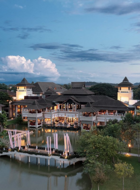 This image shows Mohnfahsai Home Resort, featuring cozy bungalows surrounded by colorful gardens. The image emphasizes the resort’s tranquil garden setting, ideal for a relaxing getaway in Chiang Rai.