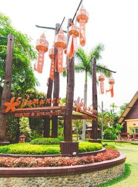 This image shows Silamanee Resort & Spa, with its traditional Thai-inspired architecture, lush gardens, and inviting pool area. The image highlights the resort’s balance of affordability and cultural charm.