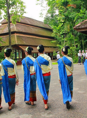 Lanna-Cultural-Tour-Chiang-Rai This image shows a Lanna cultural tour in Chiang Rai, where visitors experience the rich traditions of Northern Thailand. Activities like cooking classes and trekking provide an immersive cultural experience that highlights the region’s unique heritage.