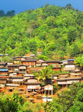 11. Lahu Hilltribe Village This image shows the traditional Lahu Hilltribe Village, nestled in green hills with unique wooden homes. The daily life of villagers, traditional clothing, and stunning surroundings offer a deep cultural experience and excellent photography opportunities.