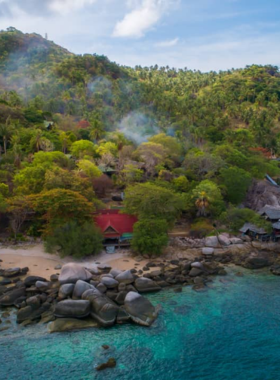 This image shows the vibrant coral reefs and colorful fish found at Sai Nuan Beach. The hidden gem is perfect for underwater photography, offering a peaceful spot for capturing the marine ecosystem. The rustic charm of the beach with its hammocks and swings provides the perfect setting for relaxed beach photography as well.