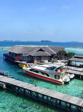 This image shows the tranquil beaches of the Kepulauan Seribu, a collection of islands off the coast of Jakarta. Known for their pristine white sandy beaches and clear turquoise waters, these islands provide the perfect getaway from the hustle and bustle of the city. Visitors can enjoy snorkeling, swimming, or simply relaxing on the beach in a peaceful environment. The islands are home to vibrant coral reefs and offer a serene escape with natural beauty at every turn. This image shows the tranquil beaches of the Kepulauan Seribu, a collection of islands off the coast of Jakarta. Known for their pristine white sandy beaches and clear turquoise waters, these islands provide the perfect getaway from the hustle and bustle of the city. Visitors can enjoy snorkeling, swimming, or simply relaxing on the beach in a peaceful environment. The islands are home to vibrant coral reefs and offer a serene escape with natural beauty at every turn.