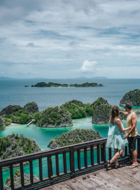 This image shows the stunning underwater landscape of Raja Ampat, West Papua, with vibrant coral reefs and diverse marine life. Known for being one of the best diving destinations in the world, Raja Ampat offers crystal-clear waters and an array of marine species. The surrounding islands are just as breathtaking, with dramatic cliffs and tropical jungles. A paradise for divers and nature enthusiasts, Raja Ampat is a remote and untouched destination perfect for those looking to connect with nature.