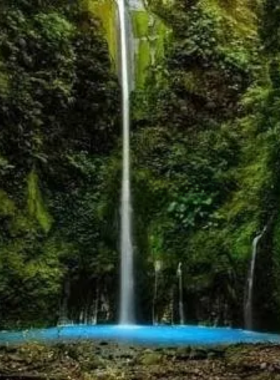 This image shows the breathtaking Sibolangit Waterfall in North Sumatra, surrounded by lush greenery and a peaceful jungle atmosphere. The cool mist rising from the waterfall creates a refreshing experience, making it an ideal spot for nature lovers and adventure seekers. Visitors can hike through the lush forest to reach the falls and enjoy the natural beauty of the area. It’s a perfect one-day adventure for those seeking a mix of relaxation and exploration in a secluded setting.