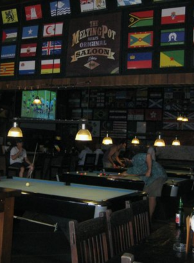 This image shows The Melting Pot Saloon, a fun and lively retro bar in Ubud. Complete with pool tables and ping pong, this place brings together a vintage touch with great music and drinks. Whether you’re there for cocktails or a friendly game, the energetic atmosphere makes it an exciting hangout, with upbeat 80s tunes adding to the vibe.
