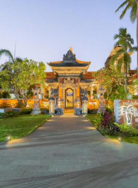 This image shows the lively family-friendly atmosphere at Bali Garden Beach Resort, located right on the beach. With spacious rooms, a large outdoor pool, a kids' club, and a variety of dining options, the resort offers a vibrant experience for families looking to relax by the beach while enjoying activities for all ages.