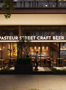 This image shows Pasteur Street Brewing Company, a renowned brewery in Vietnam. The photo highlights the cozy taproom with rows of beer glasses, showcasing unique blends like lemongrass and passion fruit beers, enjoyed by visitors.