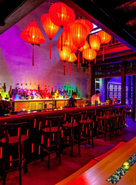 This image shows Q Bar in Hoi An, known for its historic charm and stylish ambiance. The photo captures dim lighting, creative cocktails, and an intimate setting perfect for relaxed evenings and deep conversations.