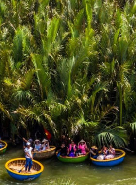 This image shows the quiet, serene environment of Ben Tre in the Mekong Delta, with its coconut plantations, peaceful rivers, and traditional villages. The rustic beauty of the area is captured through the vibrant green surroundings and the calming waters of the river, offering photographers a chance to photograph the essence of rural life in Vietnam. The laid-back atmosphere and scenic boat ride make this region perfect for capturing nature at its finest.