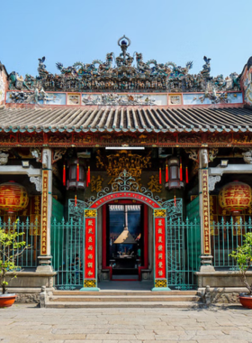 This image shows the Thien Hau Temple in Ho Chi Minh City, a perfect blend of intricate architecture and natural surroundings. The peaceful gardens and trees surrounding the temple create a harmonious environment for cultural and nature photography. The temple’s cultural significance, combined with the serene atmosphere, offers an ideal setting for photographers to capture both the beauty of Vietnamese heritage and the peaceful natural landscape around it.