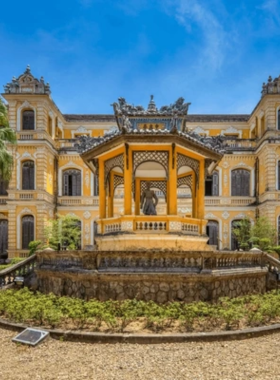 This image shows that An Dinh Palace in Hue is an elegant blend of French and Vietnamese architectural styles. The ornate façade, detailed murals, and lush garden setting are captured in the image, reflecting the palace’s historical and artistic significance. Visitors exploring its halls can experience the grandeur of the Nguyen Dynasty. The peaceful surroundings make it a quiet yet captivating attraction in Hue.