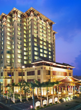 This image shows TTC Imperial Hotel, a boutique hotel that blends modern amenities with cultural charm. The image showcases its rooftop bar offering panoramic views of Hue City, a sparkling swimming pool, and elegantly designed rooms with traditional Vietnamese decor. With concierge services, delicious dining options, and proximity to popular landmarks, this hotel offers a relaxing yet culturally immersive experience for its guests. The serene ambiance is perfect for leisure and business travelers.