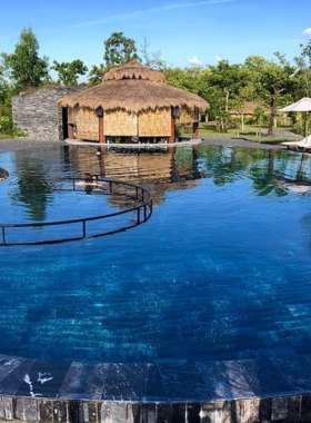 This image shows Alba Wellness Resort by Fusion, a wellness-focused resort built around natural hot springs in Hue. The photo highlights its calming environment, luxurious spa facilities, and yoga spaces designed for relaxation. Guests can also enjoy spacious rooms, outdoor pools, and healthy dining options. Perfect for families and couples, this resort provides a peaceful getaway for those seeking tranquility and rejuvenation amidst nature.