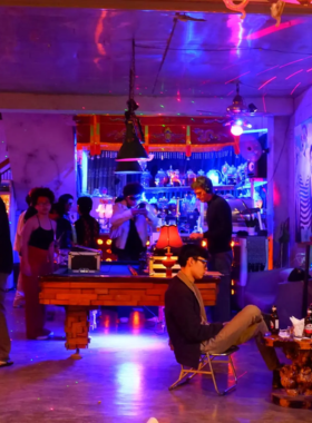 This image shows the vibrant dance floor at OCB Bar in Hue, where the energy is high and the crowd is ready to party. The lively atmosphere is filled with a mix of local and international music, creating the perfect environment for dancing and enjoying a fun night out. The friendly bartenders and nonstop drinks contribute to the energetic vibe that makes OCB Bar a must-visit for party lovers.