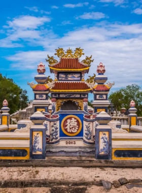 This image shows the vibrant and intricately designed tombs of An Bang Cemetery, a cultural landmark in Hue. The colorful tombs stand out against the lush green surroundings, making the cemetery a unique and fascinating photography subject. The image captures the serenity and beauty of the place, which blends cultural traditions and artistic designs. An Bang Cemetery offers a glimpse into Vietnam's history and beliefs, making it a perfect spot for those looking for something unusual yet beautiful to explore.