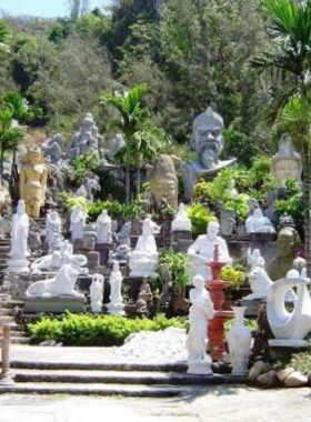 This image shows artisans at work in the Non Nuoc Stone Carving Village, located at the foot of the Marble Mountains. The image captures the intricate stone carvings being shaped by skilled hands, showcasing the region’s traditional craftsmanship. Visitors can watch the artisans create beautiful sculptures and purchase unique pieces as souvenirs. The village reflects the cultural heritage of Da Nang, and this image highlights the blend of artistry and craftsmanship that makes it a fascinating cultural stop.