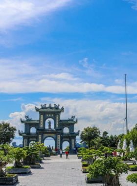 This image shows that Linh Ung Pagoda on Son Tra Peninsula features the giant statue of the Lady Buddha, offering a peaceful and spiritual atmosphere. The surrounding forest and views of Da Nang make it a great spot for both cultural and nature photography. Visitors can capture stunning images of the iconic Buddha statue against a backdrop of natural beauty, combining cultural heritage and landscape photography.