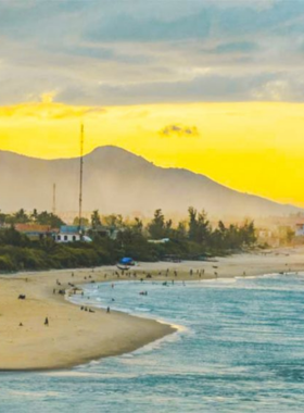 This image shows that Lang Co Beach offers beautiful coastal views, making it an ideal destination for beach photography. The long stretch of sandy beach, crystal-clear waters, and surrounding lagoons provide a serene setting to capture nature at its finest. This hidden gem in Da Nang is perfect for photographers who love capturing peaceful coastal landscapes, with occasional glimpses of local wildlife along the shore.