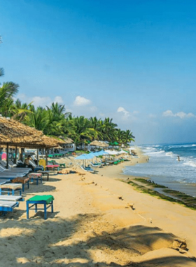 This image shows a scenic sunset at Cua Dai Beach in Hoi An. The orange glow of the setting sun reflects beautifully on the gentle waves, offering a calming view. The beach is quieter and less crowded, making it ideal for peaceful moments. Nearby, visitors enjoy fresh seafood at small eateries lining the shore. The image captures the tranquil charm of this less-visited but equally beautiful beach, a perfect spot for those seeking a relaxing escape.