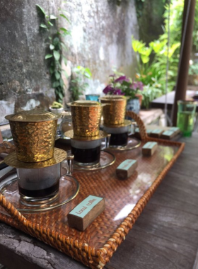 This image shows Reaching Out Tea House in Hoi An, a peaceful, socially responsible tea house run by a deaf community. The serene setting, coupled with an impressive selection of teas, creates a calm and relaxing experience for guests. The tea is prepared with precision, and the quiet ambiance allows visitors to enjoy their beverages mindfully. The tea house’s commitment to providing opportunities for the deaf community adds a meaningful layer to your visit, making it a special place to stop by while exploring Hoi An.