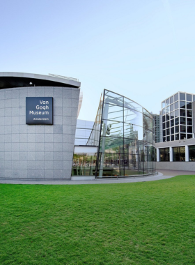 This image shows the Van Gogh Museum in Amsterdam, where visitors embark on an emotional journey through the life and art of Vincent van Gogh. The museum showcases iconic paintings like Sunflowers and The Bedroom, providing a deeper understanding of Van Gogh's struggles and brilliance. The interactive exhibits make it engaging for everyone, even those not usually interested in art galleries. The museum’s modern design and peaceful ambiance invite reflection, making it a memorable stop for art enthusiasts.