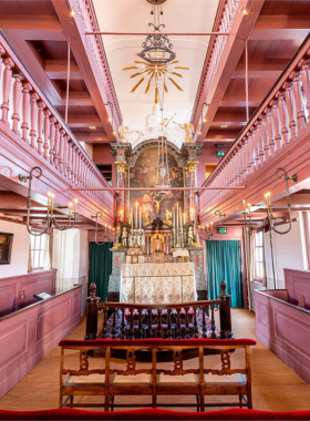 This image shows Museum Ons’ Lieve Heer op Solder, a hidden Catholic church inside a 17th-century canal house in Amsterdam. The church, preserved in the attic of a private home, offers a glimpse into the religious history of the city during a time when Catholicism was banned. Visitors can explore the beautifully restored church and the museum’s collection of Dutch interiors. It’s a unique, off-the-beaten-path experience that highlights Amsterdam’s rich cultural and religious past. This image shows Museum Ons’ Lieve Heer op Solder, a hidden Catholic church inside a 17th-century canal house in Amsterdam. The church, preserved in the attic of a private home, offers a glimpse into the religious history of the city during a time when Catholicism was banned. Visitors can explore the beautifully restored church and the museum’s collection of Dutch interiors. It’s a unique, off-the-beaten-path experience that highlights Amsterdam’s rich cultural and religious past.