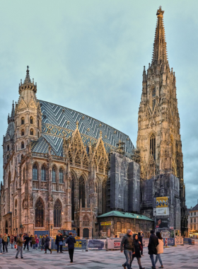 This image shows St. Stephen’s Cathedral, a stunning Gothic landmark in the heart of Vienna. With its striking spires and colorful roof, the cathedral is one of the most recognizable sights in the city. Visitors can explore its intricate interiors, climb the tower for panoramic views, or take a tour of the underground catacombs. It’s a beautiful example of Vienna’s rich architectural and religious heritage, making it a must-visit location.