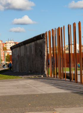 This image shows the Berlin Wall Memorial, where visitors can walk along preserved sections of the wall and learn about the city’s divided past. It is an important site in Berlin, featuring exhibits that tell the heartbreaking stories of those who lived through the Cold War and the eventual fall of the wall. The memorial offers a deep, emotional insight into Berlin’s transformation, providing a powerful reflection on the city’s history and the people’s resilience.