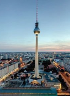 This image shows Alexanderplatz, Berlin's main shopping district, bustling with activity. Here, visitors can find everything from high-street brands to quirky boutiques. The square is home to various shopping malls, restaurants, and cafes, making it a hub for retail therapy. After shopping, you can relax at one of the trendy spots around the square, people-watch, or enjoy a delicious meal while experiencing the energetic vibe of Berlin’s urban life.