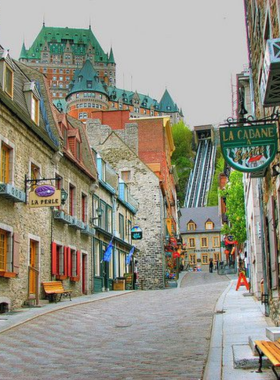 This image shows the charming streets of Old Quebec (Vieux-Québec), with its cobblestone roads, colorful historic buildings, and cozy shops. The area is known for its European feel, and it's a perfect place to take a relaxing stroll while admiring the city's rich history and culture. Visitors can explore landmarks like the Place Royale and the beautiful Notre-Dame-des-Victoires Church. It's an essential stop for anyone visiting Quebec City.