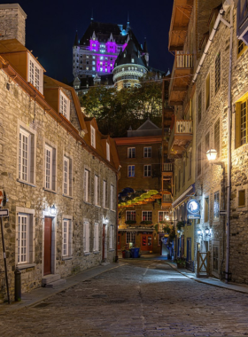 This image shows the charming streets of Petit Champlain District in Quebec City. The area is known for its narrow, cobblestone roads, boutique shops, and vibrant cafes. It’s one of the oldest and most picturesque neighborhoods in the city. The buildings are beautifully preserved, and during winter, the area is decorated with festive lights, creating a magical atmosphere. Petit Champlain is the perfect place for visitors to enjoy shopping, dining, and exploring the local culture.