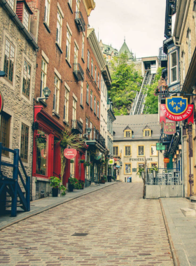 This image shows the funicular railway that connects Upper and Lower Quebec City, offering a scenic ride with views of the St. Lawrence River and the historic old town. The funicular is a convenient and fun way for visitors to move between these two areas, making it easier to explore the charming streets of Petit Champlain and the Old Port without the steep uphill walk. It’s a quick and enjoyable way to see the city from a different angle.