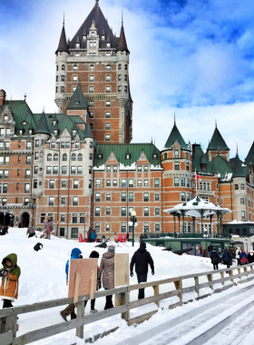 This image shows the vibrant and festive atmosphere of the Quebec Winter Carnival, one of the largest winter festivals in the world. The carnival features snow sculptures, parades, ice canoe races, and plenty of fun outdoor activities. During the event, Quebec City transforms into a snowy wonderland, attracting thousands of visitors each year. Whether you're watching the parade or taking part in the winter activities, the Winter Carnival offers an unforgettable experience filled with excitement and joy.