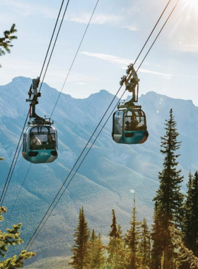 This image shows the Banff Gondola ascending Sulphur Mountain, offering spectacular panoramic views of Banff National Park. The gondola ride takes visitors from the base up to the summit, providing a bird’s-eye view of the surrounding valleys, lakes, and mountain ranges. Visitors can enjoy the boardwalk at the top and take in the fresh alpine air while experiencing the grandeur of the Rockies. This image shows that the Banff Gondola is an ideal way to enjoy breathtaking views without the effort of hiking.