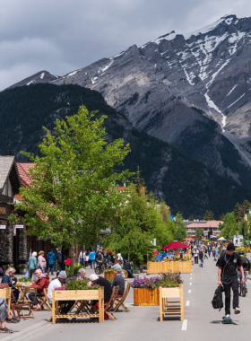 This image shows the charming streets of Banff Town, where visitors can explore local shops, cozy cafes, and restaurants. The town offers a blend of mountain town charm and vibrant culture, with its picturesque streets lined with charming buildings. Visitors can enjoy a leisurely walk, shop for unique souvenirs, or stop by a café for a warm drink while taking in the stunning mountain views. This image shows that Banff Town is a perfect place to unwind and enjoy the local atmosphere.