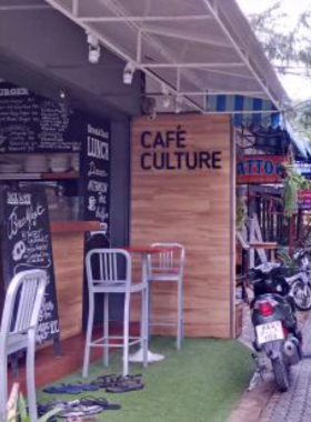 This image shows Café Culture Coffee, a charming cafe offering freshly brewed coffee and delicious pastries. It's a great spot to relax in a cozy environment and start your day with a comforting breakfast.