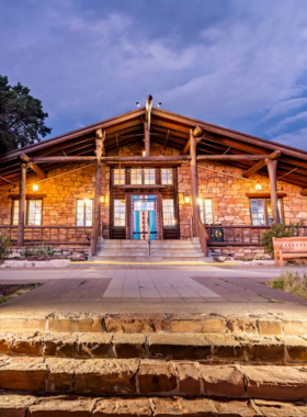 This image shows the Grand Canyon Lodge, a peaceful retreat where visitors can unwind and enjoy the stunning views of the canyon. Located on the North Rim, the lodge offers a cozy atmosphere with warm food and comfortable accommodations. It’s an ideal place to relax after a long day of exploring the canyon, with plenty of opportunities to enjoy a sunset drink, savor a meal, or simply take in the beauty of the surrounding landscape in a calm, serene setting.