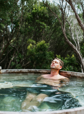 This image shows a person relaxing in a luxurious spa, enjoying a peaceful and rejuvenating experience in Hot Springs, Arkansas. The town is famous for its wellness treatments, including massages, facials, and mineral baths. Whether after a day of adventure or simply looking to unwind, visiting a spa in Hot Springs offers the perfect way to pamper yourself. This image captures the tranquil environment of the spa, offering a serene and refreshing way to relax in this renowned wellness destination.