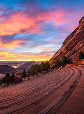 This image shows the breathtaking Red Rocks Amphitheatre, with massive red sandstone formations surrounding the outdoor concert venue. The natural beauty of the place makes it one of the most iconic performance venues in the world. It is famous for hosting concerts in a stunning open-air setting, with views of the surrounding mountains. Even without a show, Red Rocks is a popular spot for hiking, photography, and exploring, making it an unforgettable experience for visitors to Denver.